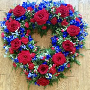 An stunning open heart tribute. Deep Red Roses with contrasting purple veronica and subtle foliage. Available in any colour. 24 hours notice or similar design same day delivery. Due to seasonal variations some items may be substituted to produce a display of equal quality and value. We can offer delivery by our own drivers or click and collect is available. Professionally arranged by our expert florists with care. Delivered by hand by our own driver. Due to seasonal variations some items may be substituted to produce a display of equal quality & value.