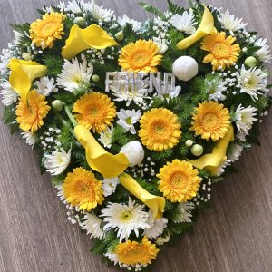 solid heart in bright colours funeral tribute heart can be in any colours of your choice. Same day delivery.