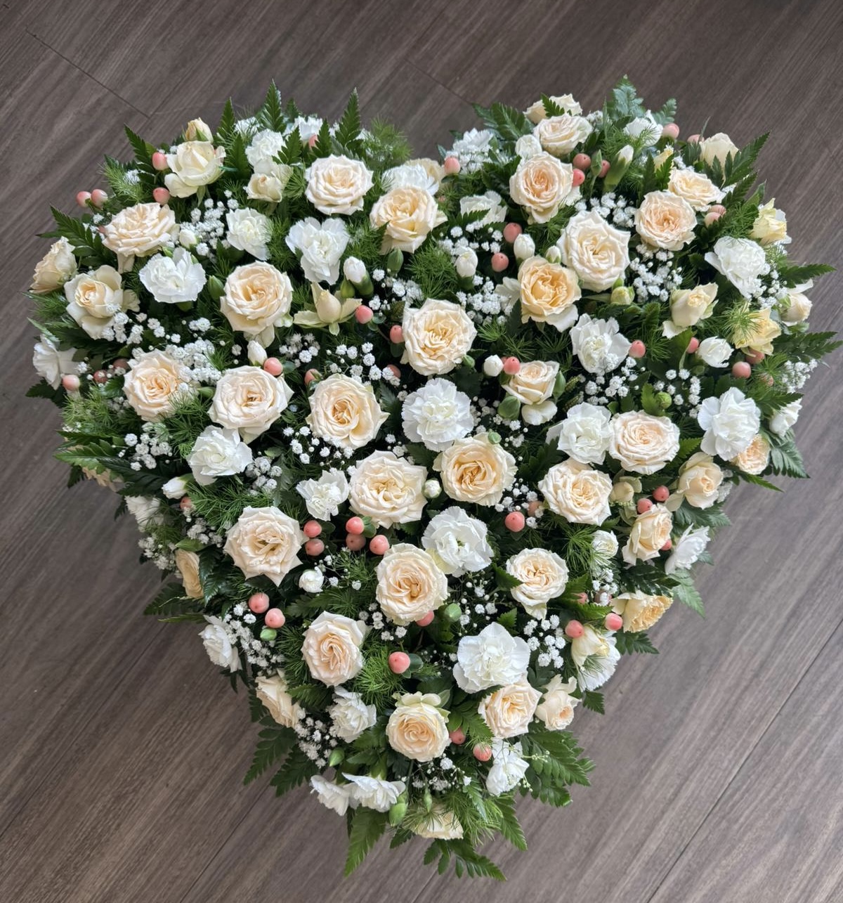 solid heart in bright colours funeral tribute heart can be in any colours of your choice. Same day delivery.