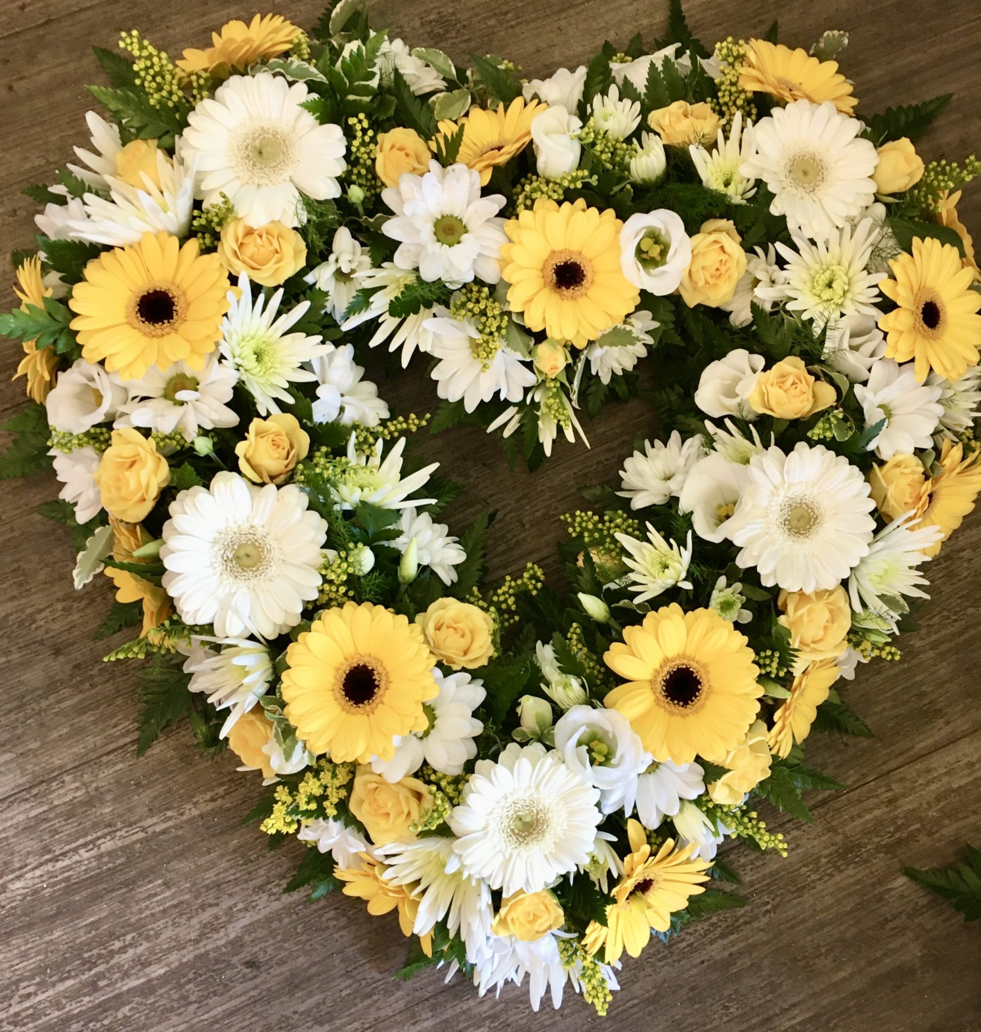 A pretty and delicate open heart can be in any colours of your choice. Same day delivery. Due to seasonal variations some items may be substituted to produce a display of equal quality and value.