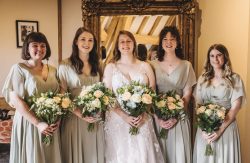 Bridal bouquet of soft tones of peaches & cream roses