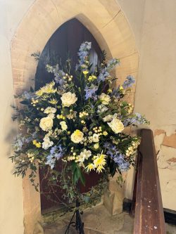 Church flowers of Delphiniums & Roses